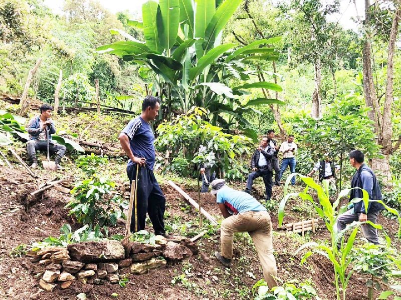 Officials from the Department of Land Resources during their visit to Vibeilietuo Kets’ Coffee Farm on June 26. (Morung Photo)